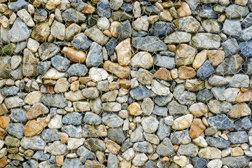 Modern Privacy Fence of Natural Rock Gabions, Walls made of stone and iron Made by welding steel into a sieve and then put the stone in the middle,style of hotel or office Building,Selective focus.