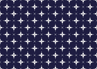 White symbol floral on dark blue background, ethnic fabric seamless pattern, design for cloth, carpet, batik, wallpaper, wrapping etc.
