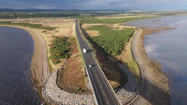 Dornoch firth bridge in North of Scotland with view of the ocean