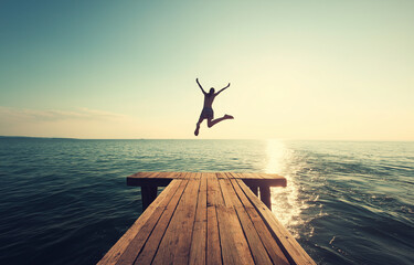 Jumping off the pier, jumping into the sea, new zealand beach holiday, Summer holiday, vacations, joyful, at last, dreams come true