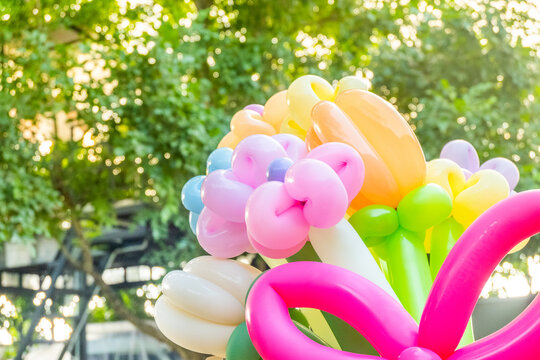 Balloons twisted into a blossoming flower bouquet in garden,Flowers Balloon to decorate the place,bouquet with colorful balloon flowers..