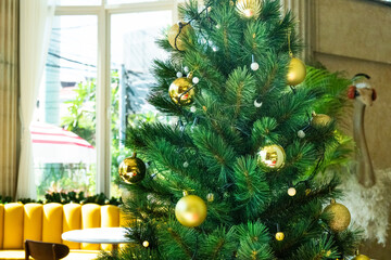 Christmas Tree with Decorations in cozy home interior,Festive image in holiday,Merry Christmas and Happy New Year..