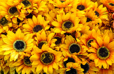 close up on artificial sunflower background