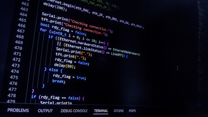 Programming code on a computer screen. Source code photo. Embedded System Technology background. 
