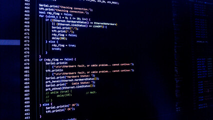 Obraz premium Programming code on a computer screen. Source code photo. Embedded System Technology background. 