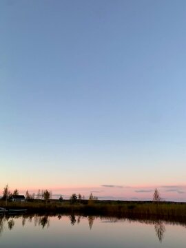 sunset over the river in Finlands archipelago