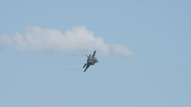 A vapour trail can seen on the wingtips of FA-18 Growler equiped with Electronic Warfare contermeasures