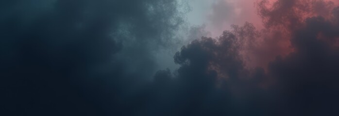 A cloudy sky with a train track in the background