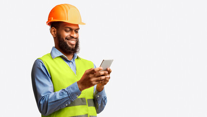 African Builder Worker Using Smartphone Building App Standing On White Studio Background. Panorama, Copy Space
