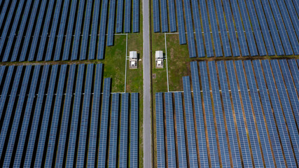 Aerial view solar panel hybrid power plant, Solar panel platform system photovoltaic module, Solar panel power plant renewable energy source, Eco technology electric power industry.