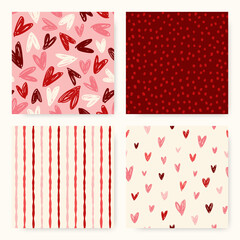 Set of seamless patterns for Valentine's day. Doodle heart patterns, matching wobbly stripes, and random dots in dark red, red, pink, and white.