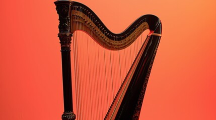 A harp displayed against a warm coral backdrop