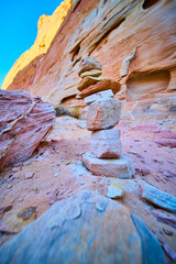 Desert Cairn and Sandstone Cliffs Tranquility Low Angle View