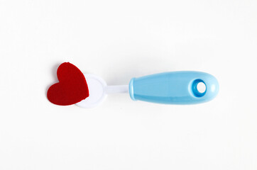 dentist tools for children isolated on white with red heart shapes. celebrate valentine day. playset for kids, imaginative learning montessori check or oral care tool.