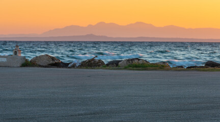 cgi backplate production.Asphalt parking lot flight with sea view during sunrise