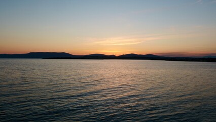 Sunset and seascape - high quality image of the sunset over the sea captured by drone.