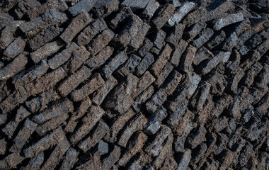 Pile of peat bricks used for fuel