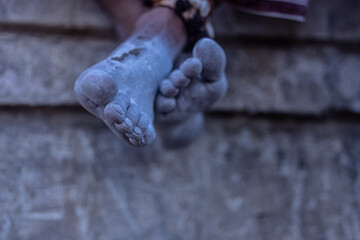 Shot of an human leg with ash painted on the leg during the masan holi celebration at varanasi.