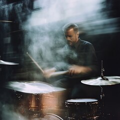 Drummer performing on stage in smoky atmosphere. (2)