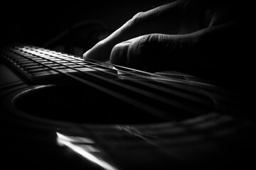 A musical instrument with strings in close-up.