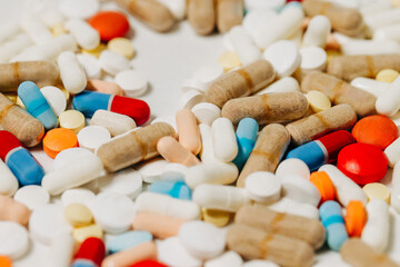 Pile of colored prescription pills, tablets, and capsules