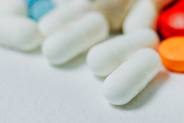White and colored pills and capsules