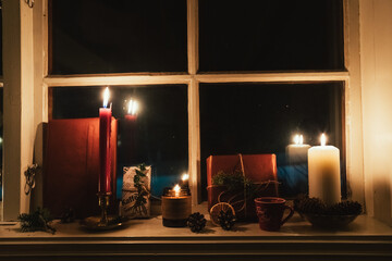 Cozy Christmas Window with Candles and Gifts