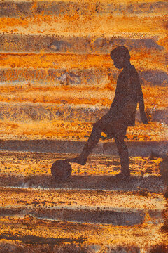 Barefoot footballer in rust illustration
