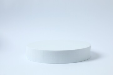 Props for product photography. Podium on a white background