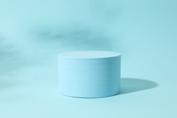 Props for product photography. Blue podium on a colored background