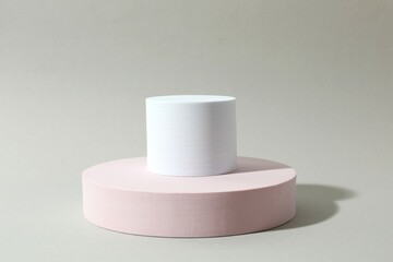 Props for product photography. Different podiums on a gray background