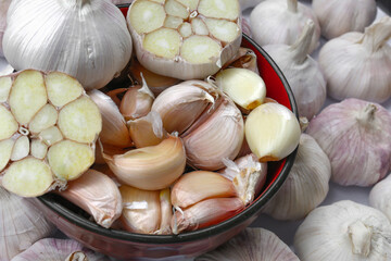 Garlic cloves, Chinese garlic. On white background dry food ingredients. For presentation, food, education, and garlic advertising.
