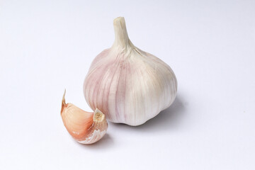Garlic cloves, Chinese garlic. On white background dry food ingredients. For presentation, food, education, and garlic advertising.