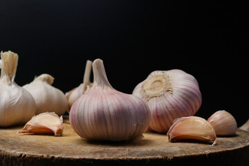 Garlic cloves, Chinese garlic. On white background dry food ingredients. For presentation, food, education, and garlic advertising.