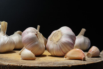 Garlic cloves, Chinese garlic. On white background dry food ingredients. For presentation, food, education, and garlic advertising.