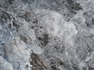 Texture d&eacute;taill&eacute;e de glace et roche dans un environnement glaciaire en Islande