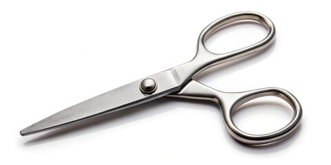 Fototapeta premium Close-up photo of a pair of silver scissors on a white background, sharp, tool, shears, cutting, metal, silver