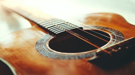 Fototapeta premium Close-up of acoustic guitar, showcasing wood grain, strings, and soundhole.