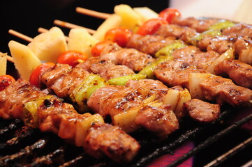 closed up barbecue grilled in a row