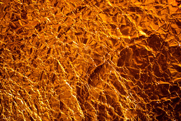 Golden Abstract Background with Textured Surface and Subtle Gradient