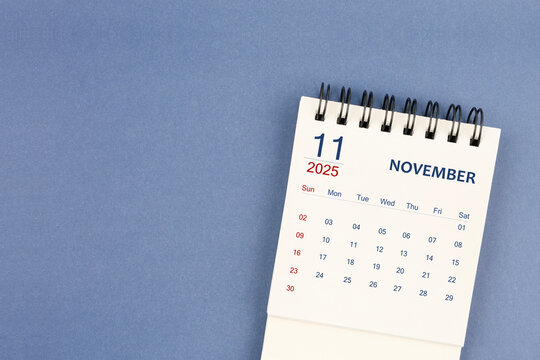November 2025 Mini monthly desk calendar for 2025 year on blue color background.