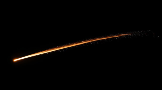 Isolated meteor streak with a fiery trail on a solid black background