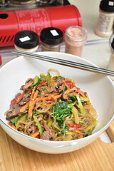 Christmas and New Year's dishes, consisting of meat satay with fried vermicelli and vegetables