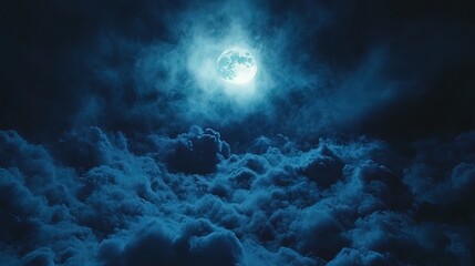 Full moon shining through dark, moody clouds at night.