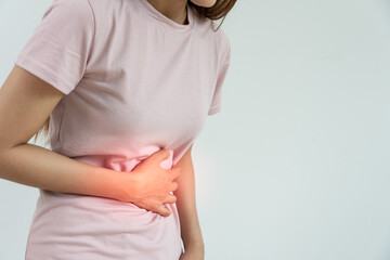 stomach ache. Asian women have abdominal pain, indigestion, gastritis, menstrual cramps,...
