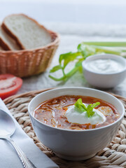 Вowl of soup borscht with sour cream