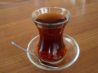 A Glass of Turkish Tea: Symbol of Warm Hospitality and Connection, Reflecting Türkiye’s Rich Culture and Timeless Traditions at the Heart of Every Conversation.