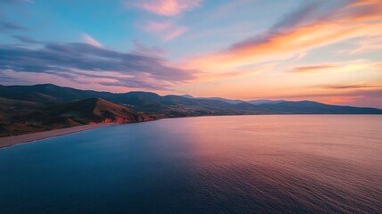 Fototapeta premium Beautiful aerial photography capturing seashore with rolling hills photos