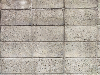 Concrete surface featuring square patterns and an even texture suitable for various design applications