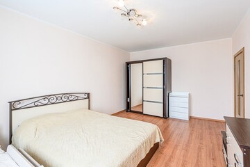 interior room apartment bedroom with bed, cozy place to sleep and relax